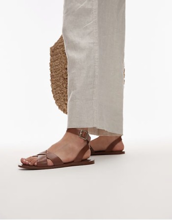 leather flat sandals in brown